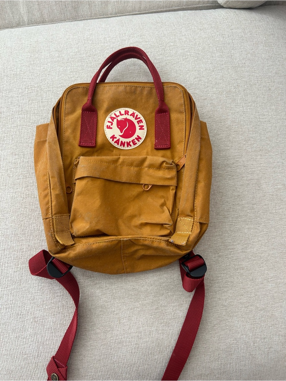 Fjallraven Kånken Mini Backpack in Mustard with Red Handles